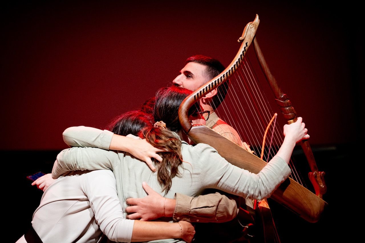 Group of musicians hugging after their performance at IYAP (2024)